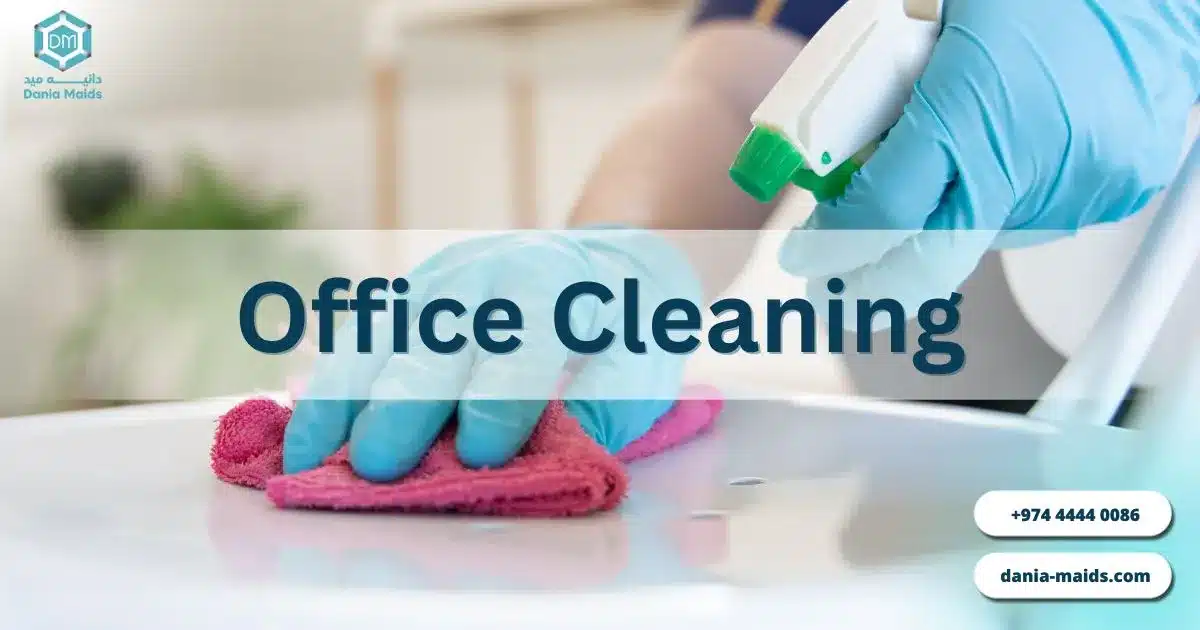 Professional office cleaning team by Dania Maids sanitizing a corporate workspace in Doha, Qatar — trusted since 1998