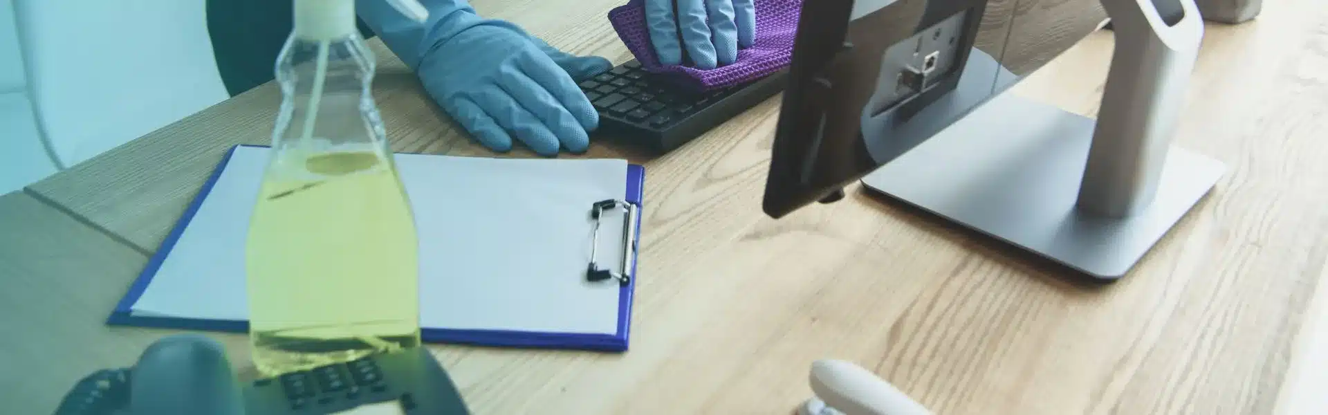 Professional office cleaning team by Dania Maids sanitizing a corporate workspace in Doha, Qatar — trusted since 1998